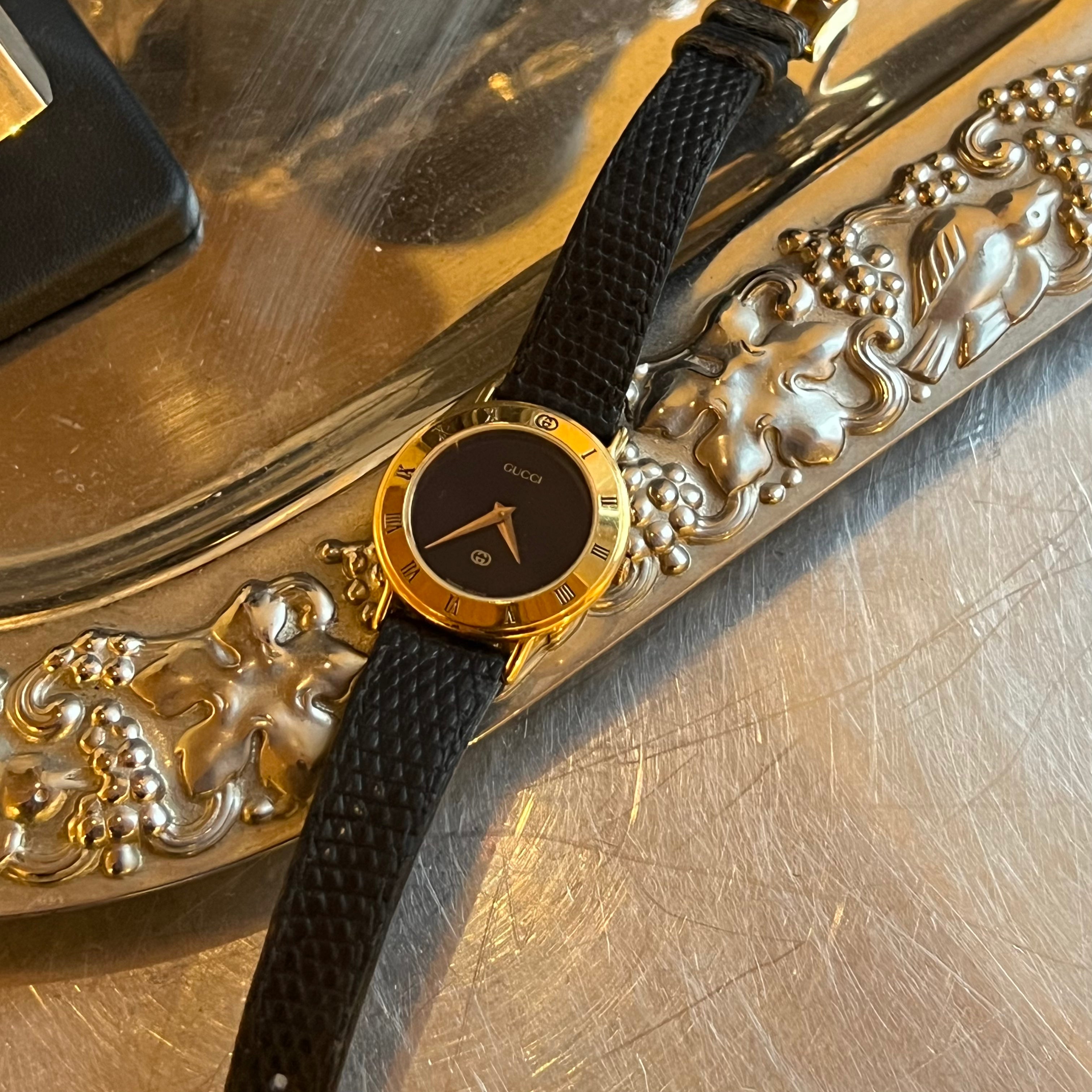 Vintage Gucci Watch with Black Leather Strap – Tarin Thomas Vintage Gucci Watch with Black Leather Strap – Tarin Thomas