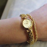 Vintage Seiko Goldtone Stainless Steel Watch with Round Cream Face