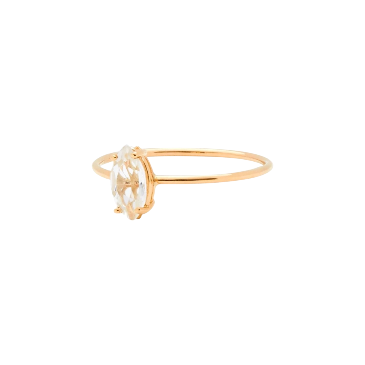Tarin Thomas Reggie ring featuring a marquise cut white topaz stone set on a delicate 14k yellow gold band