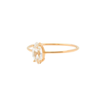 Tarin Thomas Reggie ring featuring a marquise cut white topaz stone set on a delicate 14k yellow gold band