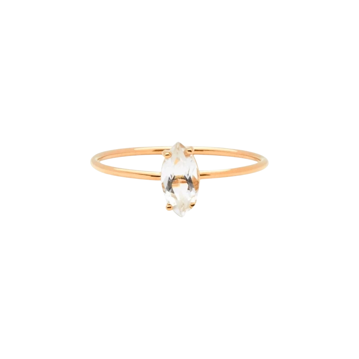 Tarin Thomas Reggie ring featuring a marquise cut white topaz stone set on a delicate 14k yellow gold band