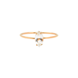 Tarin Thomas Reggie ring featuring a marquise cut white topaz stone set on a delicate 14k yellow gold band