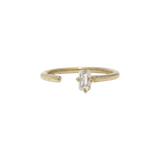 Tarin Thomas Jordan ring featuring an emerald cut white topaz stone set on a delicate open gold band