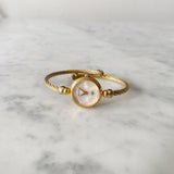 Vintage Gold Gucci Rope Watch with Mother of Pearl Face
