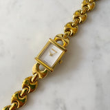 Vintage Gold Gucci Watch with Rectangular Face